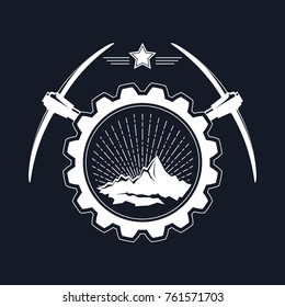 Mining Industry Emblem on Black Background, Sunburst and the Mountains in a Gear with Pickaxes and Star, Vector Illustration