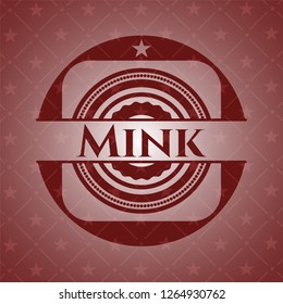 Mink badge with red background