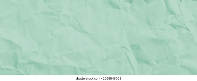 Mint green crumpled paper background, textured with folds. The background features a soft mint green color, adding a rustic feel. Paper texture background vector. Green background.