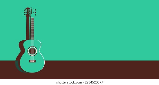 Mint green guitar on mint green background in minimal style. Place for text nearby.