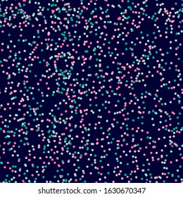 Mint, green, pink dots on blue background. Seamless pattern. Like particles falling in space. Background for gift wrapping, greeting cards, fabrics, flayer, poster. Stock vector pattern.