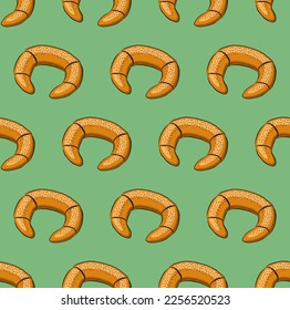 MINT GREEN SEAMLESS VECTOR BACKGROUND WITH SWEET BAGELS
