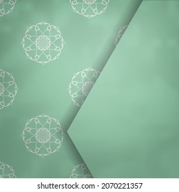 Una postal de color menta con un viejo adorno blanco está lista para imprimir.