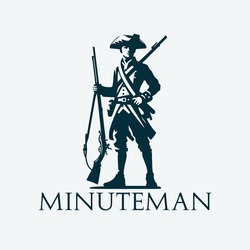 Minuteman Soldier Standing While Holding A Old Riffle.