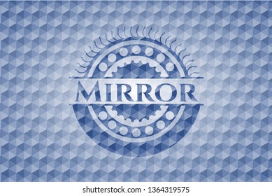 Mirror blue badge with geometric pattern.