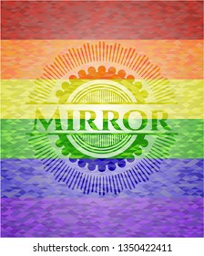 Mirror on mosaic background with the colors of the LGBT flag