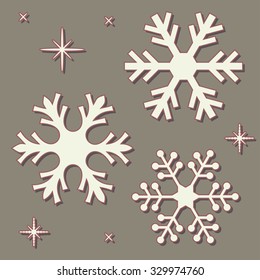 Misc beige snowflakes over vintage brown background.