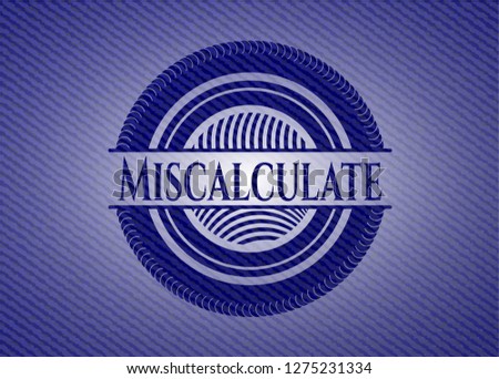 Miscalculate badge with denim background