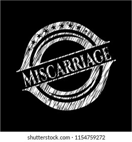Miscarriage written on a blackboard