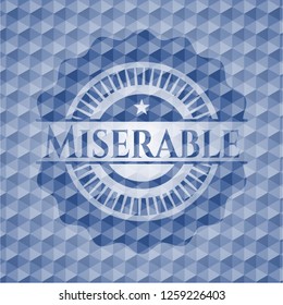 Miserable blue emblem or badge with geometric pattern background.