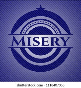 Misery emblem with jean background