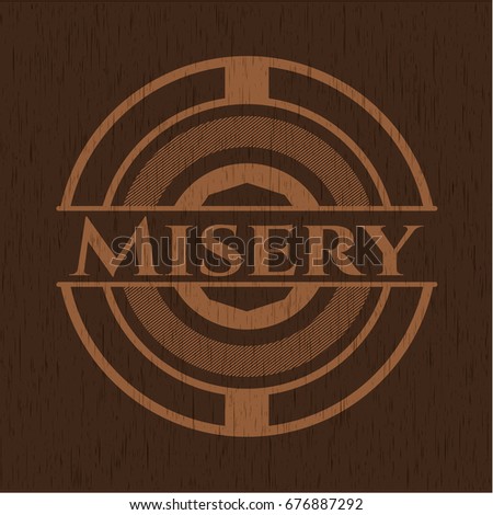 Misery wooden emblem