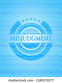 Misjudgment water concept badge.