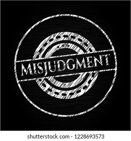 Misjudgment written on a blackboard