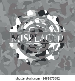 Misplaced on grey camouflage texture