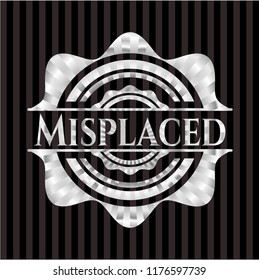 Misplaced silver badge or emblem