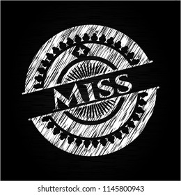 Miss chalkboard emblem on black board