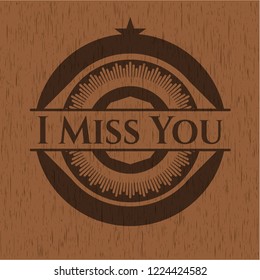 I Miss You badge with wood background