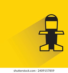 missile icon with shadow on yellow background