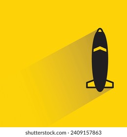 missile icon with shadow on yellow background