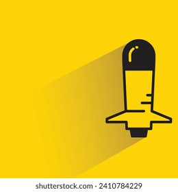 missile icon with shadow on yellow background