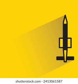 missile icon with shadow on yellow background