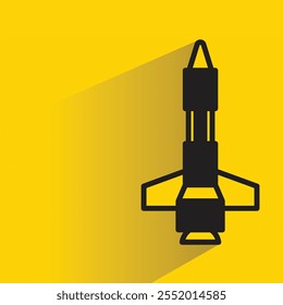 missile icon with shadow on yellow background