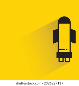 missile rocket with shadow on yellow background