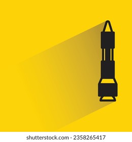 missile with shadow on yellow background