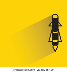 missile with shadow on yellow background