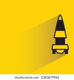 missile with shadow on yellow background
