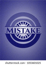 Mistake badge with denim background