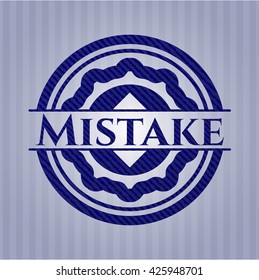 Mistake badge with denim texture