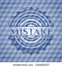 Mistake blue emblem with geometric pattern.