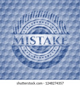 Mistake blue hexagon emblem.