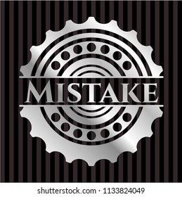 Mistake silver emblem or badge