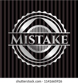 Mistake silver emblem or badge