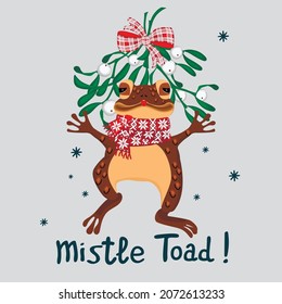 Mistle Toad Christmas Card.Cartoon funny toad in a muffler with an ornament is under a branch of a mistletoe tied with red bow.Frog Xmas Card and handwritten text.Isolated vector illustration.
