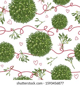 Mistletoe balls and branch seamless pattern
