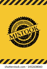 Mistook black grunge emblem with yellow background. Vector Illustration. Detailed.