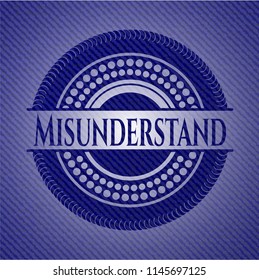 Misunderstand badge with denim background
