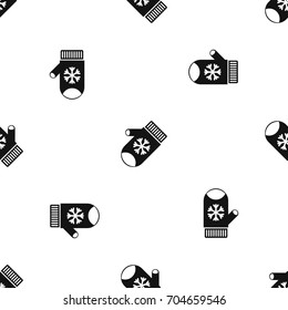 Mitten with snowflake pattern repeat seamless in black color for any design. Vector geometric illustration