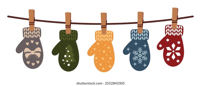 Mittens hanging on rope. Collection of colorful mittens with Christmas patterns. Warm accessory for winter. Decorative element for Christmas design.