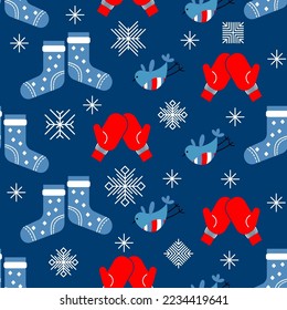 Mittens,  socks and birds seamless pattern. Winter and Christmas theme. Vector flat style design.