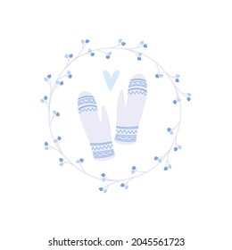 
mittens in the wreath with blue berries on the white background