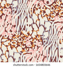 Mix animal skin prints. Leopard, tiger, giraffe and zebra seamless pattern. Textile and fabric fashion design.