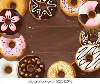 Mix of donuts on wooden background