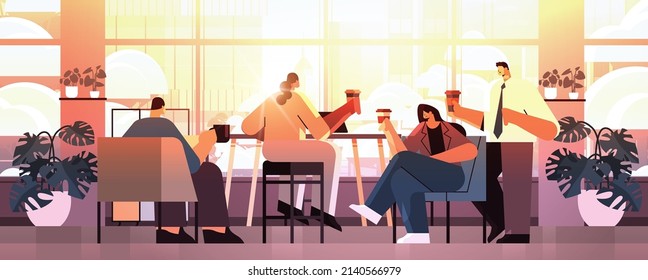 mix race businesspeople sitting at cafe table and drinking coffee during meeting modern cafeteria interior