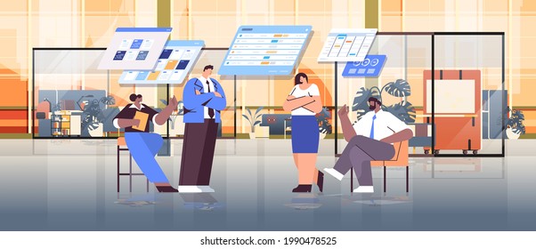 mix race businesspeople team analyzing statistic data on virtual boards successful teamwork concept