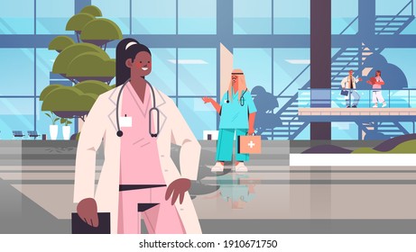 mix race doctors in uniform medical workers discussing during meeting healthcare medicine concept hospital building exterior horizontal vector illustration